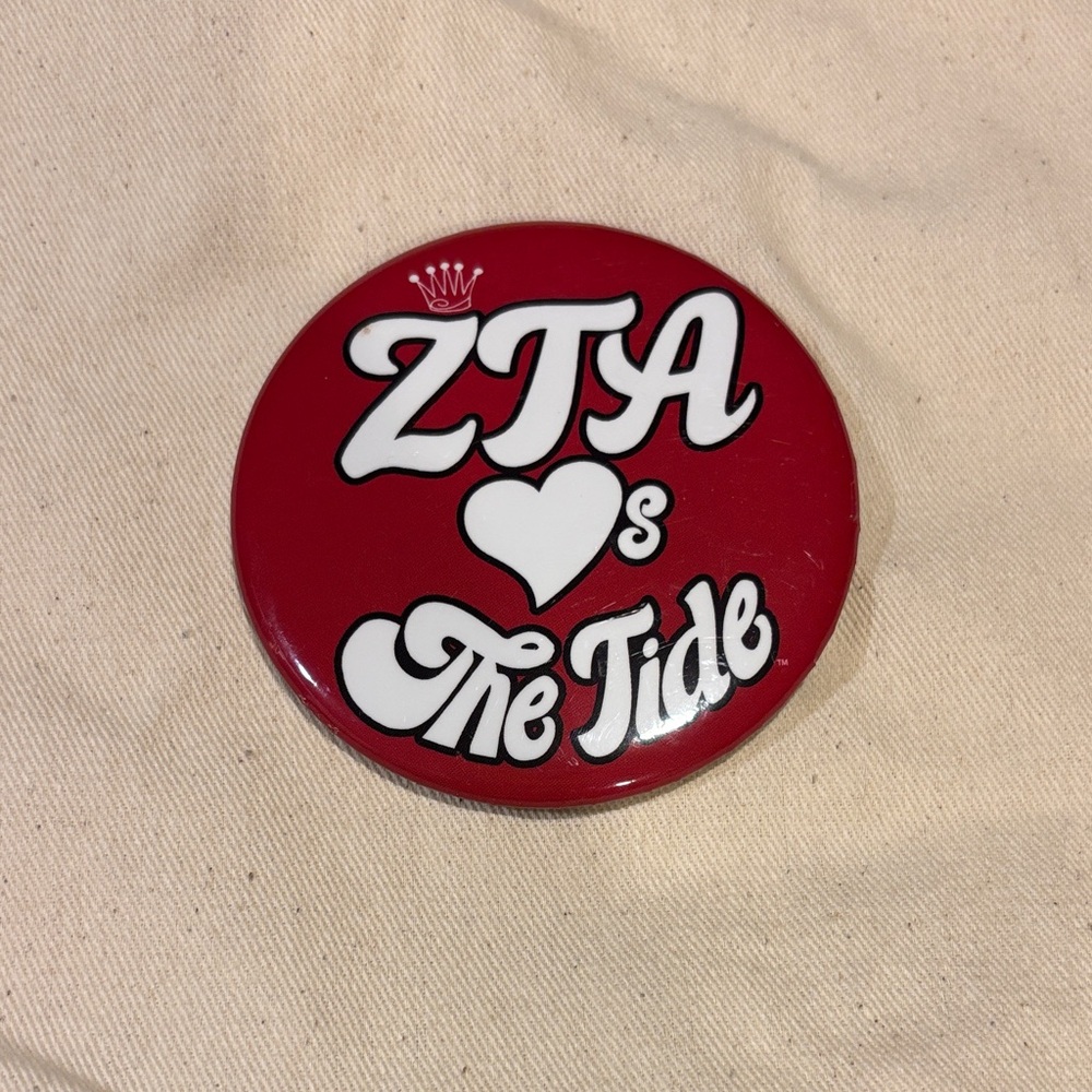 Red ZTA Button with White Text